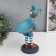 Souvenir Polystone Standing "Baby-Skomorokh with a bag" Orange-blue 33x12.5x25.5 cm