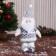 Soft toy "Santa Claus in a suit with a strap, long legs" stands, white-gray