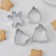 A set of forms for cutting the cookies of the share “Man, cupcake, bell, Christmas tree”, 4 pcs