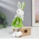 Souvenir "Bunny in a green knitted dress with a flower" 24 cm