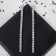 Hanging earrings with the rhinestones “path” minimal, white color in silver, 11 cm