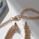 Set 3 objects: earrings, necklaces, ring "path" rectangles, white color in gold