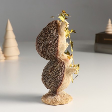 Souvenir Polystone "Hedgehogs with a garland with stars - acrobats" 6x7x15.5 cm-1