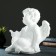 Climb "Angel sitting in his hand", 26x21x30cm, white