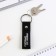 Kezzle keychain to the leatherette "First in everything!", 11 x 2.5 cm