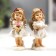 Polystone souvenir "Angel-girl with puffy cheeks with a book/rose" mix 9x3.5x3.5 cm