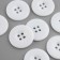 Button 4 punctures, d = 30 mm, white color