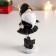 Polystone souvenir "Santa Claus in black caftan, with a star" Long legs 11.5x6.5x4.5 cm