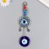 Suspension from the evil eye "Flower - Eyes and hearts" 21 cm mix