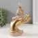 Polystone souvenir "Buddha in a white robe. At a palm" 9x16.5x22.5 cm