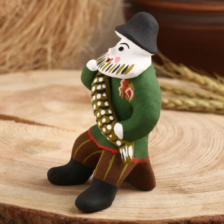 Souvenir "man with pike", Kargopol toy