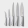 A set of kitchen knives on the ardone stand, 7 objects: 5 knives, musat and scissors, chrome color