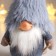 Interior doll "Santa Claus in a gray fur cap, skiing" 21x11x13 cm