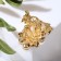 Brooch "Vinogram Bun" with flowers, rainbow color in gold