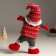 Interior doll "Santa Claus in a knitted cap with patterns - acrobat" 7x24x38 cm