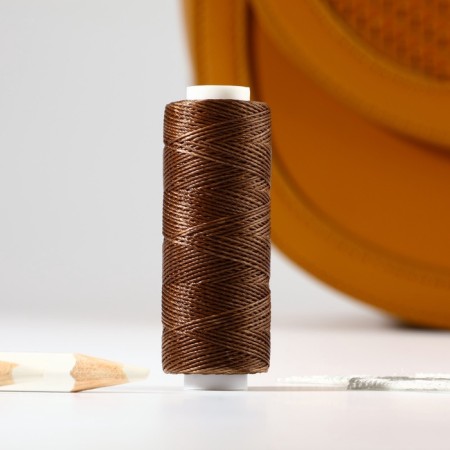 The threads are waxed, round, 300d/3, 0.35 mm, 60 ± 2 m, brown color-1