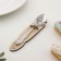 A teaspoon spoon with an engraving "fisherman", h = 14cm.