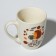 Ceramic mug with a spoon "I want Fyr-Fier", 310 ml, white color