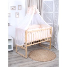 A set of sides in a crib with a canopy 