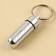 Tabertika Pill Box keychain, gray, 1.4 x 5.2 cm.
