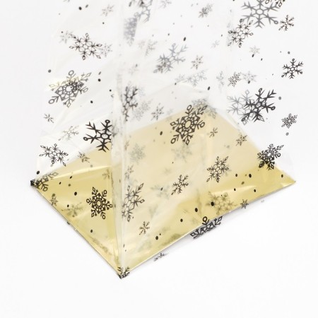 A package with a hard bottom of 11 x 17 x 55 gold "snowflakes"-3