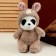 Soft toy "Panda" in a bunny suit, 25 cm