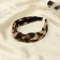 Hair cap "Coquet" 3 cm, dark leo