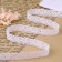 Knitted lace, 25 mm × 10 ± 1 m, white color