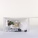 Cosmetic bag on the button, white color