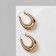 Earrings Metal are “wide” volumetric, color gold