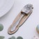 A teaspoon spoon with an engraving “queen”, h = 14cm.