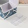 Casket for needlework "Black and white flowers on blue" 19x26x14.5 cm