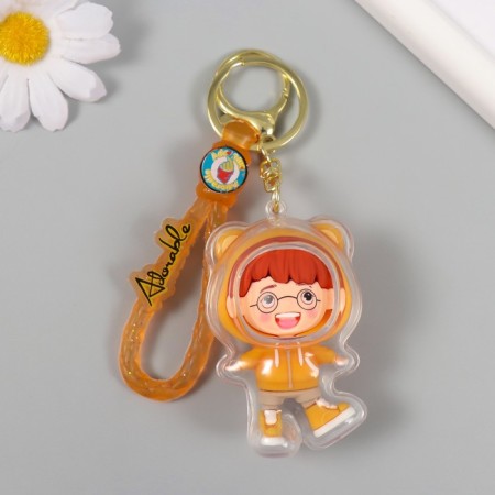 Trick rubber with carbine, strap "Boy in the orange sweatshirt" 7x4.5x3.5 cm-1