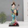 Collectible doll "Geisha in a flower kimono with a musical instrument" 30 cm