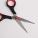 Hairdressers scissors with emphasis, blade - 6 cm, black/red color