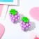 Clips children's “chosen” clusters of grapes, color green-violet
