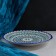 Plate of the Rishtan ceramics "Flowers", 27 cm, blue