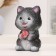Piggy bank "Cat with flower" black, 18 cm