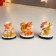 Souvenir Polystone "Red Tigrick Cook/Musician" MIX 6x4x6 cm