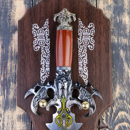 A souvenir sword on a tablet, a carved blade with a pattern, the claws of the eagle on the handle, the blade 41 cm-3