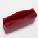 Cosmetic bag at the lightning textura, the color is red