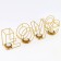 Summary of the metal desktop "Love", 13.5 x 42 cm, gold