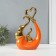 Souvenir ceramics "Elephants with heart. Abstraction" Orange with gold 7x18.5x25.5 cm