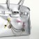 Women's bag on the Textura valve, small size, silver color