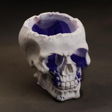 Figure candle in concrete "Crying skull", purple