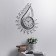 Wall clock, series: openwork, "drop with curls", smooth move, d-21 cm, 69 x 50 cm