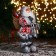 Santa Claus "In a white-red fur coat with a strap, with skis" 30 cm