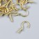 Crook screw for fastening paintings, photo frames 1.1x2.5 cm