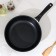 The “Tradition” pan, d = 26 cm, plastic handle, anti -stick coating, black color