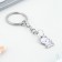A keychain for children, metal "cat", 7.2 x 1.6 cm